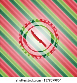 combat knife icon inside christmas colors style badge.