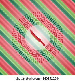 combat knife icon inside christmas colors style emblem.