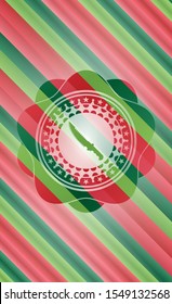 combat knife icon inside christmas colors emblem.