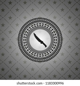 combat knife icon inside dark emblem