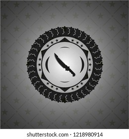 combat knife icon inside dark badge