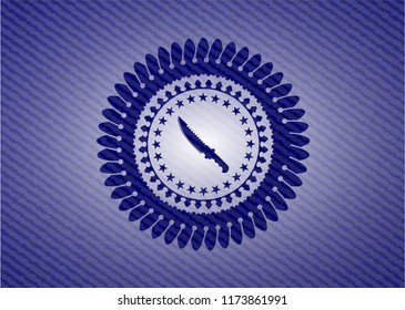 combat knife icon inside emblem with jean high quality background
