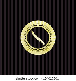combat knife icon inside gold emblem