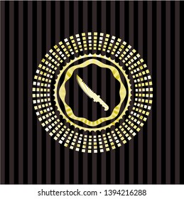 combat knife icon inside golden emblem or badge