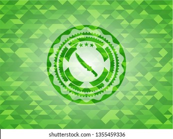 combat knife icon inside green emblem. Mosaic background