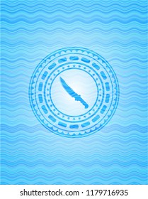 combat knife icon inside light blue water wave style emblem.