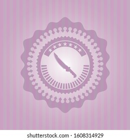 combat knife icon inside pink emblem