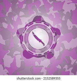 combat knife icon inside pink and purple camo texture. 