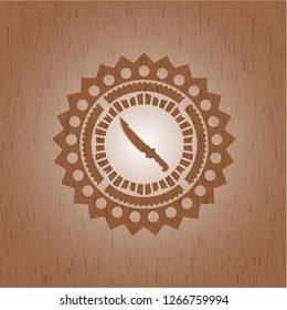 combat knife icon inside realistic wood emblem