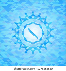 combat knife icon inside realistic light blue mosaic emblem
