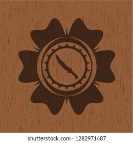 combat knife icon inside realistic wood emblem