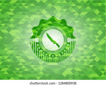 combat knife icon inside realistic green emblem. Mosaic background