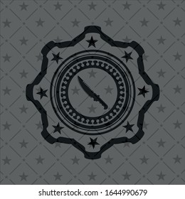 combat knife icon inside realistic black emblem