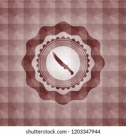 combat knife icon inside red seamless emblem or badge with geometric pattern background.