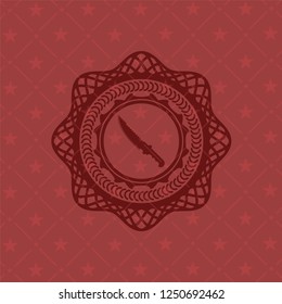 combat knife icon inside red icon or emblem