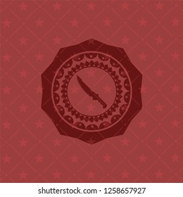 combat knife icon inside red icon or emblem