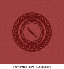combat knife icon inside retro style red emblem