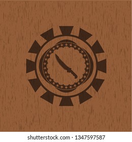 combat knife icon inside retro wood emblem