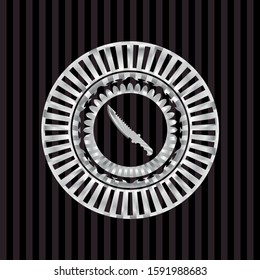 combat knife icon inside silver badge
