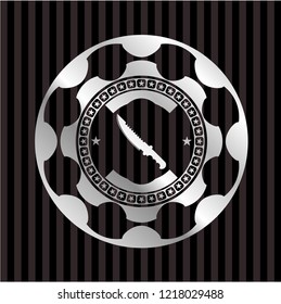 combat knife icon inside silvery emblem or badge