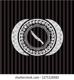 combat knife icon inside silvery badge or emblem