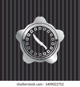 combat knife icon inside silvery emblem or badge