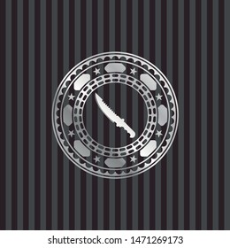 combat knife icon inside silvery emblem or badge