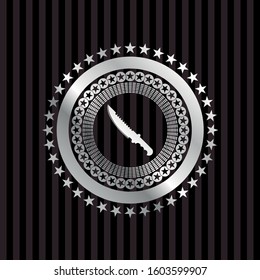 combat knife icon inside silvery badge