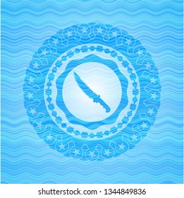 combat knife icon inside water concept style emblem.
