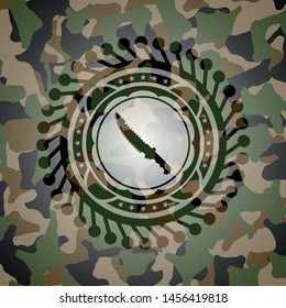 combat knife icon on camo pattern