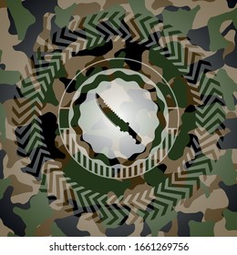 combat knife icon on camouflaged texture