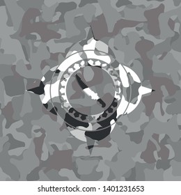 combat knife icon on grey camo texture