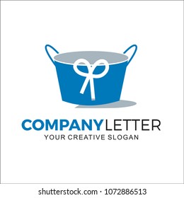 Combination Bucket and Ribbon Shopping Design Logo