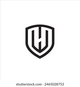 combination logo of the letters W and H and a shield