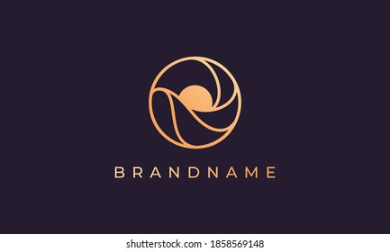 a combination of sea wave and sun in a circle with a luxury gold shape suitable for use as a logo