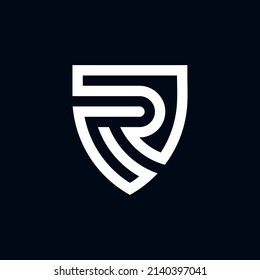 combined shield with the letter R in it