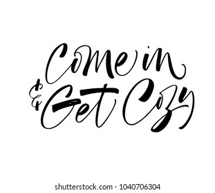 Come in and get cozy phrase. Ink illustration. Modern brush calligraphy. Isolated on white background.