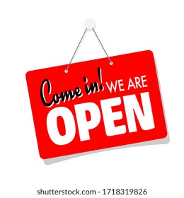 Come in, we are open on door sign hanging