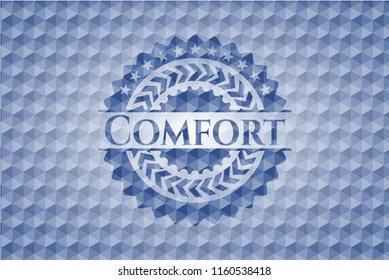 Comfort blue badge with geometric background.