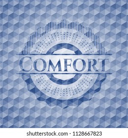 Comfort blue badge with geometric pattern background.