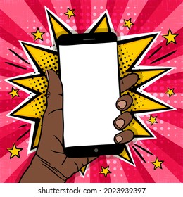Comic bright banner with mobile phone in black hand. Explosion, Smartphone with blank screen and stars in pop art style. Template for web design, banners, cards, coupons, posters. Vector illustration