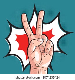 comic hand showing victory gesture. pop art peace sign on halftone background. vector illustration