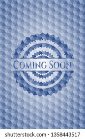 Coming Soon blue badge with geometric pattern background.