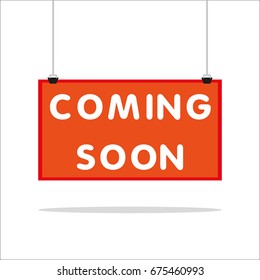 Coming soon hanging sign isolated on white wall