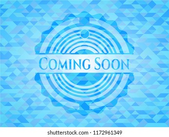 Coming Soon light blue emblem with triangle mosaic background
