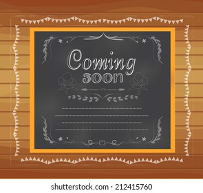coming soon written on chalkboard