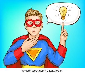 Coming up with super idea, great thought pop art vector concept. Teenager boy with amazed, surprised face in hero costume with red cape and mask pointing on lamp bulb in speak cloud illustration