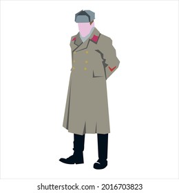 Der Kommandant der Roten Armee der UdSSR in einem Wintermantel des Modells von 1941 in einem Hut mit Ohrfeigen steht hinter seinem Rücken mit den Händen.