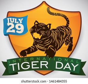 Commemorative design with glossy shield and tiger silhouette in it representing the conservation and protection of this big cats during International Tiger Day in July 29.