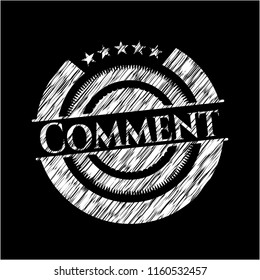 Comment chalkboard emblem written on a blackboard